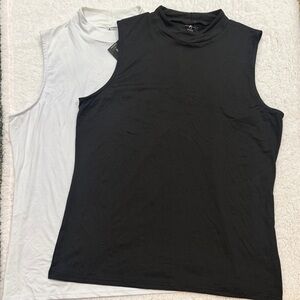 Ashley Stewart Black and White Muscle Tees both included